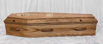Oak finish coffin with oak handles, warm oak colour
